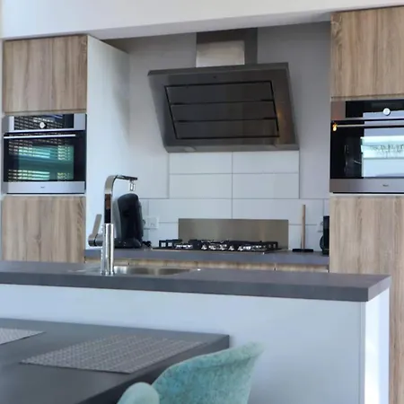 Holiday home Modern House With Decorative Fireplace